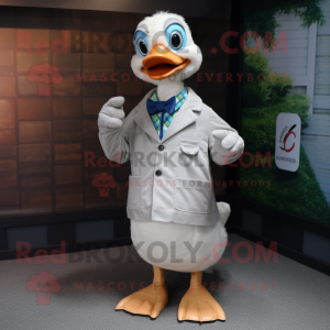 Silver Geese mascot costume character dressed with a Oxford Shirt and Cufflinks