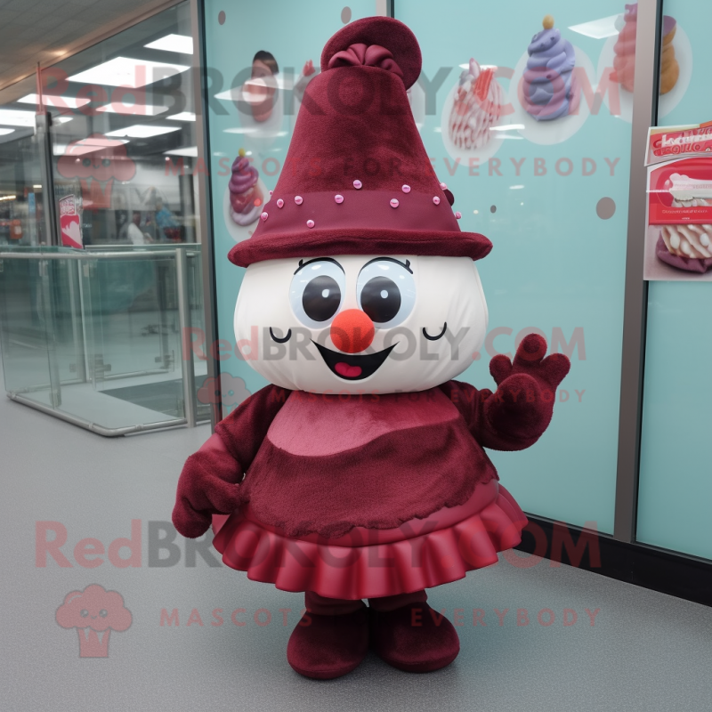 Maroon Cupcake mascot costume character dressed with a Dress and Hats