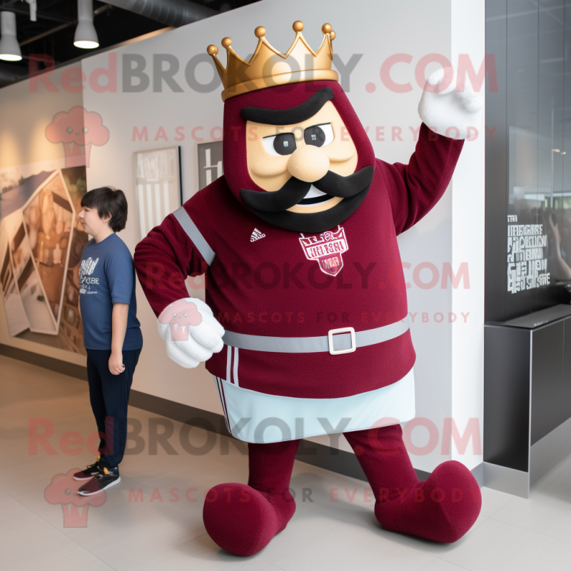 Maroon King mascot costume character dressed with a Shorts and Bracelets Maroon King mascot costume character dressed with a Shorts and Bracelets