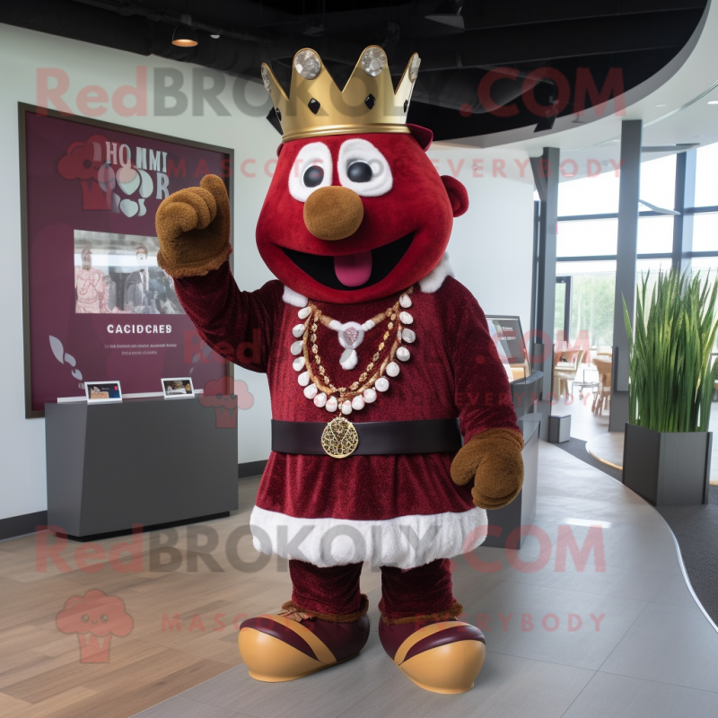 Maroon King mascot costume character dressed with a Shorts and Bracelets Maroon King mascot costume character dressed with a Shorts and Bracelets