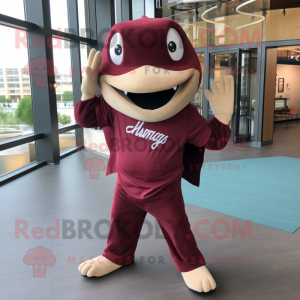 Maroon Stingray mascot costume character dressed with a Baseball Tee and Messenger bags