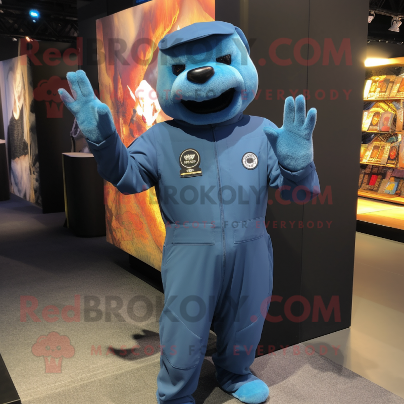 Cyan Navy Seal mascot costume character dressed with a Jumpsuit and Hair clips Cyan Navy Seal mascot costume character dressed with a Jumpsuit and Hair clips