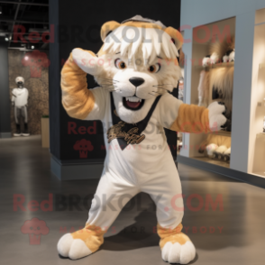 Cream Saber-Toothed Tiger mascot costume character dressed with a Leggings and Headbands