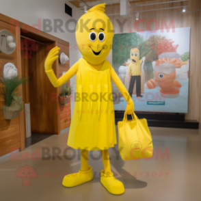 Lemon Yellow Stilt Walker mascot costume character dressed with a Shift Dress and Tote bags