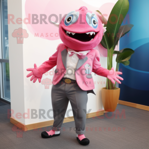 Pink Piranha mascot costume character dressed with a Blazer and Headbands