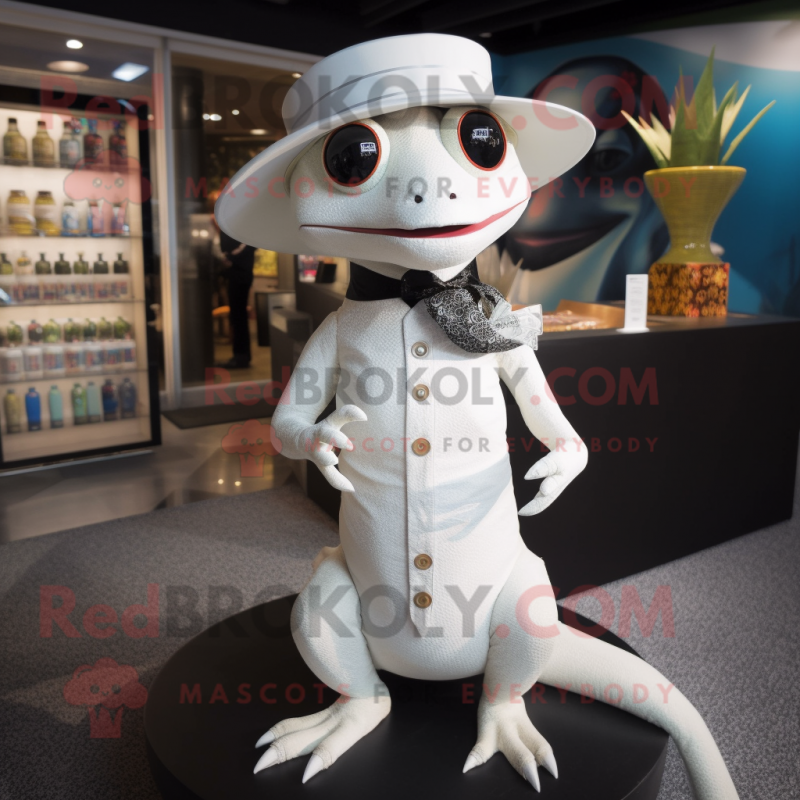 White Geckos mascot costume character dressed with a Skirt and Hat pins White Geckos mascot costume character dressed with a Skirt and Hat pins