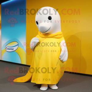 Yellow Beluga Whale mascot costume character dressed with a Wrap Skirt and Earrings