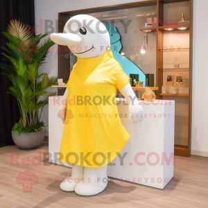 Yellow Beluga Whale mascot costume character dressed with a Wrap Skirt and Earrings