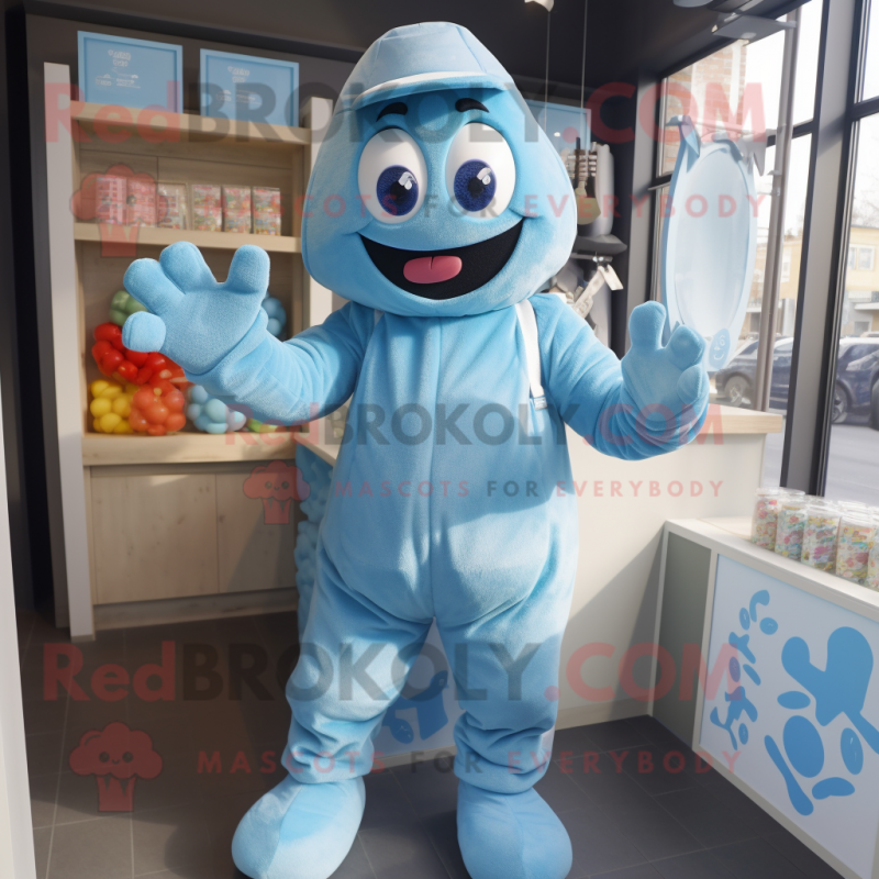 Sky Blue Candy Box mascot costume character dressed with a Dungarees and Gloves Sky Blue Candy Box mascot costume character dressed with a Dungarees and Gloves