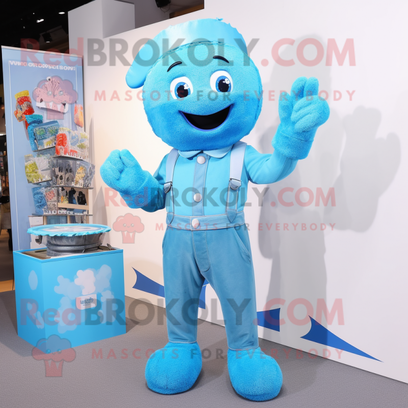 Sky Blue Candy Box mascot costume character dressed with a Dungarees and Gloves Sky Blue Candy Box mascot costume character dressed with a Dungarees and Gloves