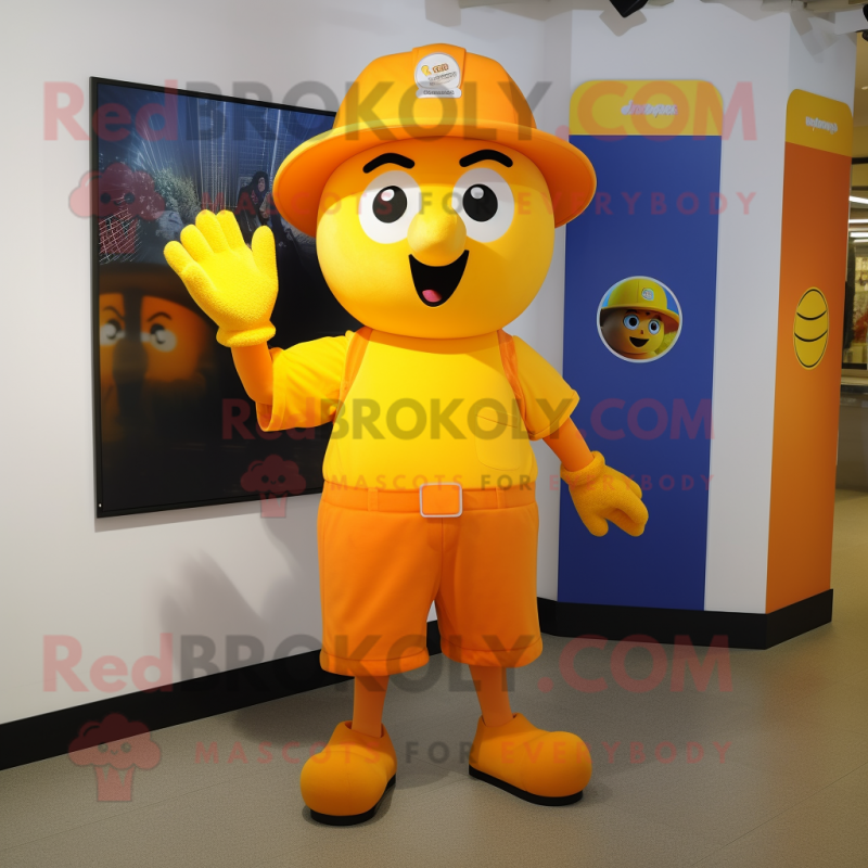 Yellow Orange mascot costume character dressed with a Shorts and Caps