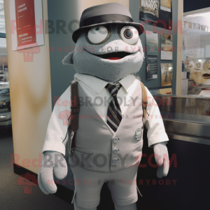 Gray Cod mascot costume character dressed with a Henley Tee and Ties