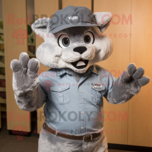 Gray Bobcat mascot costume character dressed with a Denim Shirt and Hat pins