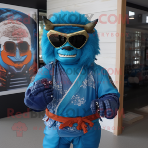 Blue Samurai mascot costume character dressed with a Rash Guard and Sunglasses