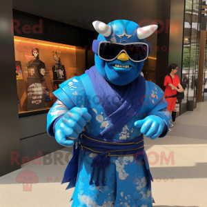 Blue Samurai mascot costume character dressed with a Rash Guard and Sunglasses