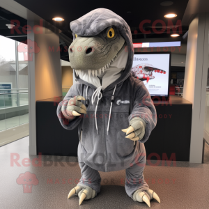 Gray Tyrannosaurus mascot costume character dressed with a Parka and Keychains