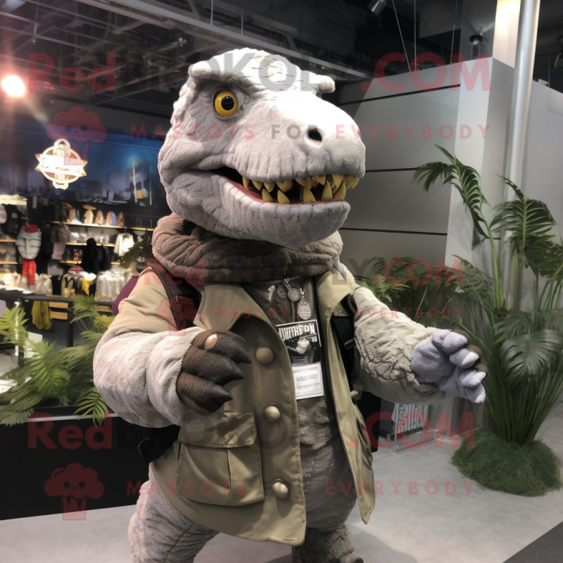 Gray Tyrannosaurus mascot costume character dressed with a Parka and Keychains