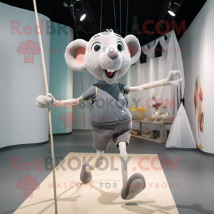 Gray Tightrope Walker mascot costume character dressed with a Running Shorts and Tote bags