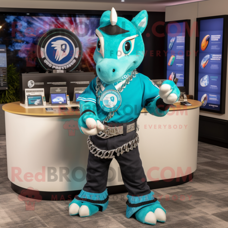 Turquoise Horseshoe mascot costume character dressed with a Graphic Tee and Bracelets Turquoise Horseshoe mascot costume character dressed with a Graphic Tee and Bracelets