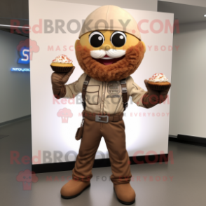 Tan Cupcake mascot costume character dressed with a Moto Jacket and Suspenders