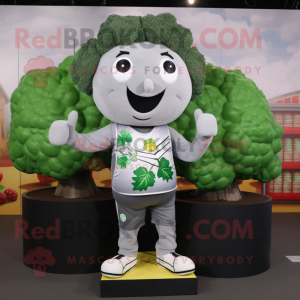 Silver Broccoli mascot costume character dressed with a Vest and Headbands