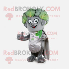 Silver Broccoli mascot costume character dressed with a Vest and Headbands