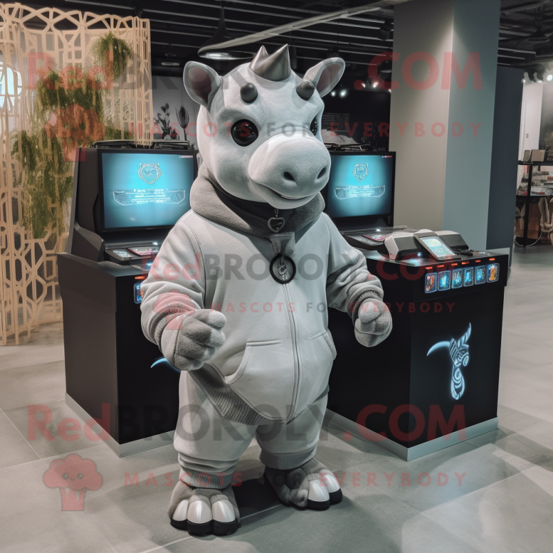 Gray Rhinoceros mascot costume character dressed with a Hoodie and Earrings