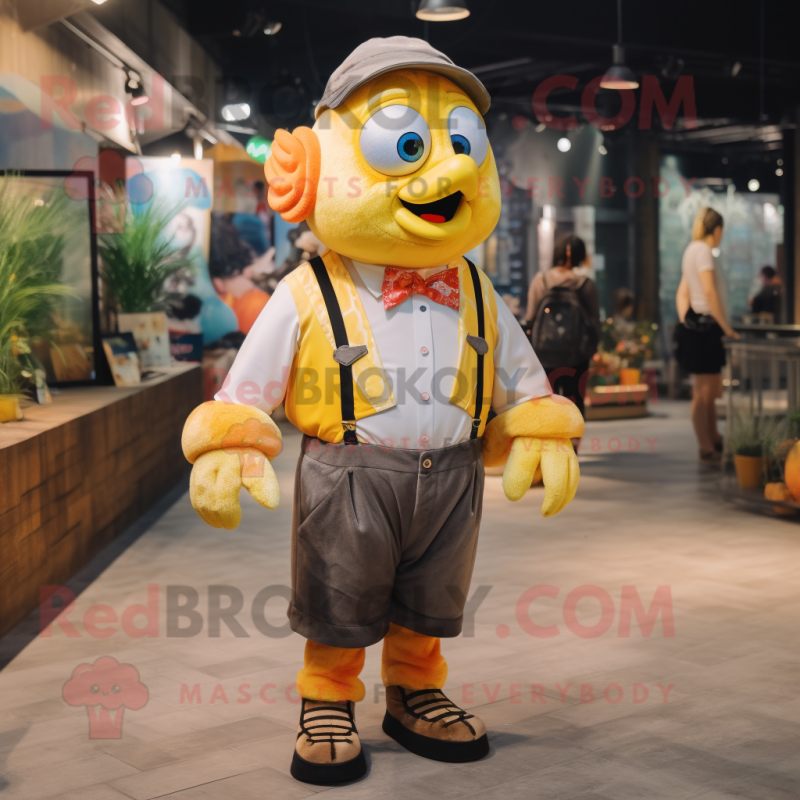 Lemon Yellow Clown Fish mascot costume character dressed with a Oxford Shirt and Suspenders