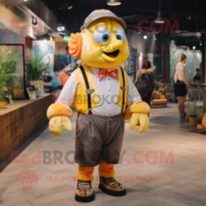 Lemon Yellow Clown Fish mascot costume character dressed with a Oxford Shirt and Suspenders