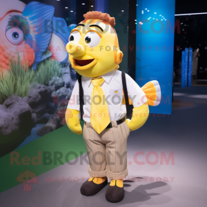 Lemon Yellow Clown Fish mascot costume character dressed with a Oxford Shirt and Suspenders