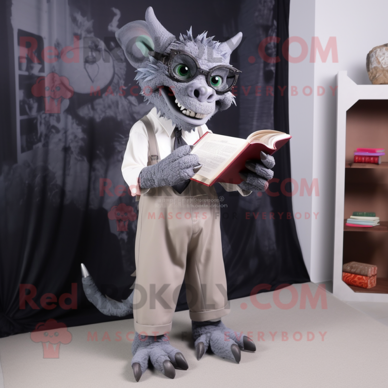 Gray Gargoyle mascot costume character dressed with a Dress Pants and Reading glasses