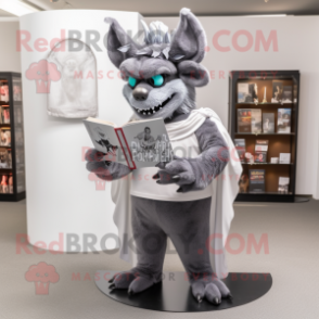 Gray Gargoyle mascot costume character dressed with a Dress Pants and Reading glasses