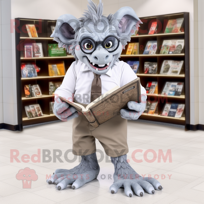 Gray Gargoyle mascot costume character dressed with a Dress Pants and Reading glasses