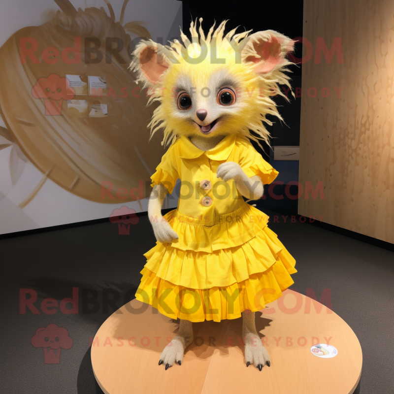 Yellow Aye-Aye mascot costume character dressed with a Pleated Skirt and Rings