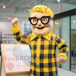 Yellow Trapeze Artist mascot costume character dressed with a Flannel Shirt and Reading glasses