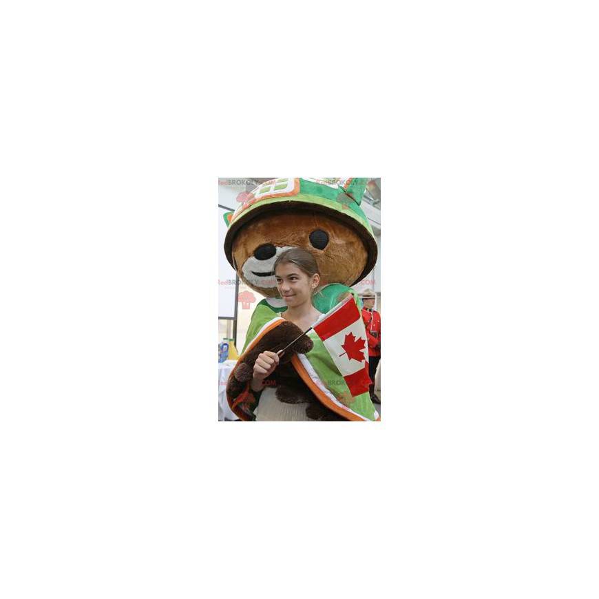 Mascotte d'ours marron avec une cape et un casque vert -