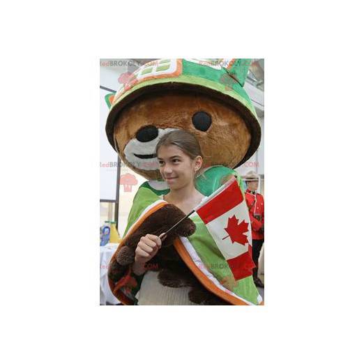 Mascotte d'ours marron avec une cape et un casque vert -