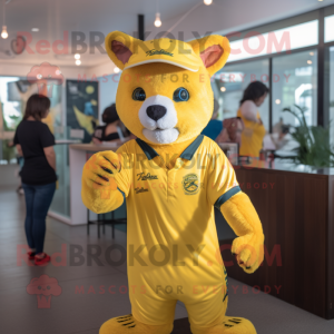 Lemon Yellow Jaguarundi mascot costume character dressed with a Polo Tee and Headbands