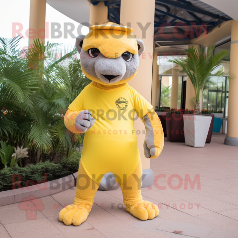 Lemon Yellow Jaguarundi mascot costume character dressed with a Polo Tee and Headbands