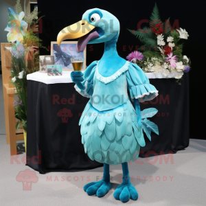 Teal Dodo Bird mascot costume character dressed with a Cocktail Dress and Clutch bags