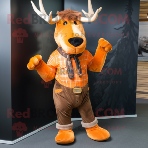 Orange Irish Elk mascot costume character dressed with a Jeans and Gloves