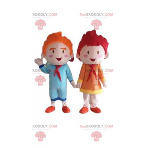2 mascotte di bambini, bambole, un ragazzo e una ragazza -