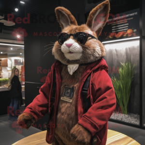 Maroon Wild Rabbit mascot costume character dressed with a Parka and Eyeglasses