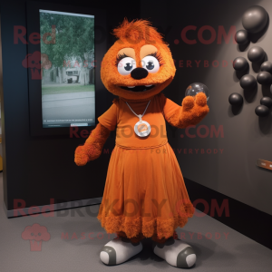 Rust Juggle mascot costume character dressed with a Empire Waist Dress and Keychains