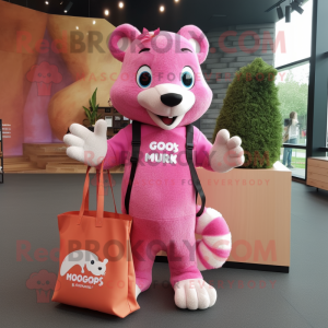 Pink Mongoose mascot costume character dressed with a T-Shirt and Tote bags