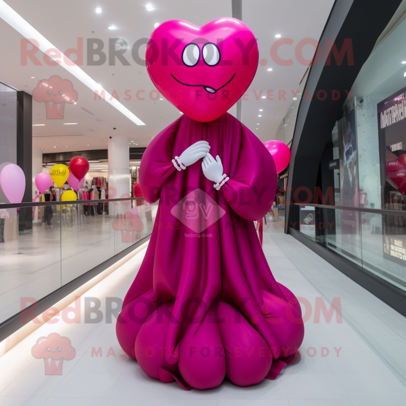 Magenta Heart Shaped Balloons mascot costume character dressed with a Evening Gown and Lapel pins