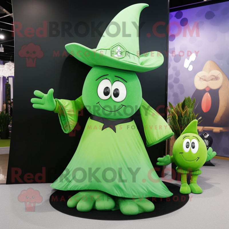 Green Witch'S Hat mascot costume character dressed with a Yoga Pants and Clutch bags Green Witch'S Hat mascot costume character dressed with a Yoga Pants and Clutch bags