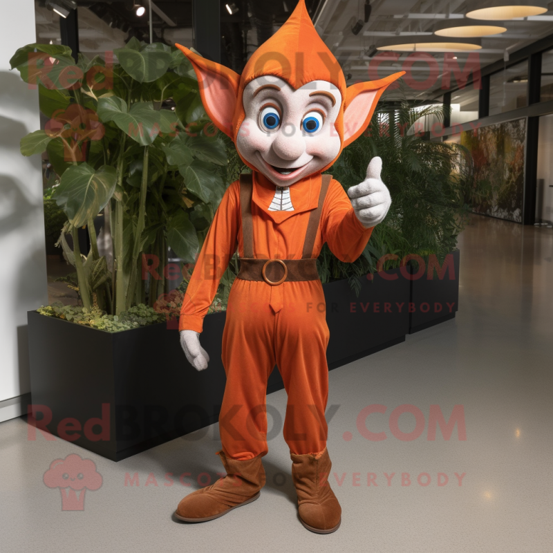 Rust Elf mascot costume character dressed with a Jumpsuit and Tie pins