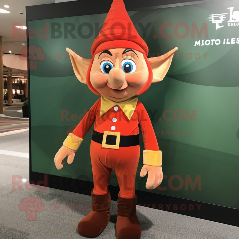 Rust Elf mascot costume character dressed with a Jumpsuit and Tie pins Rust Elf mascot costume character dressed with a Jumpsuit and Tie pins