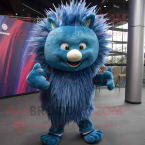Blue Porcupine mascot costume character dressed with a Flare Jeans and Wraps